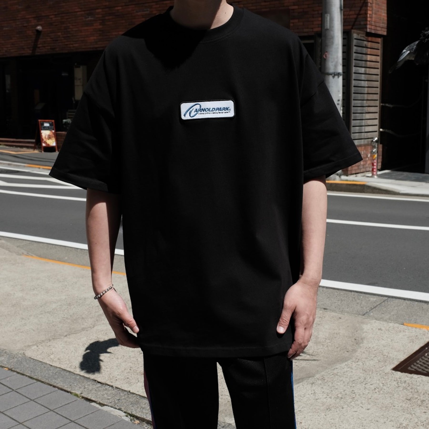 ARNOLD PARK STUDIOS / GLOBAL LEADER LOGO SS T BLACK