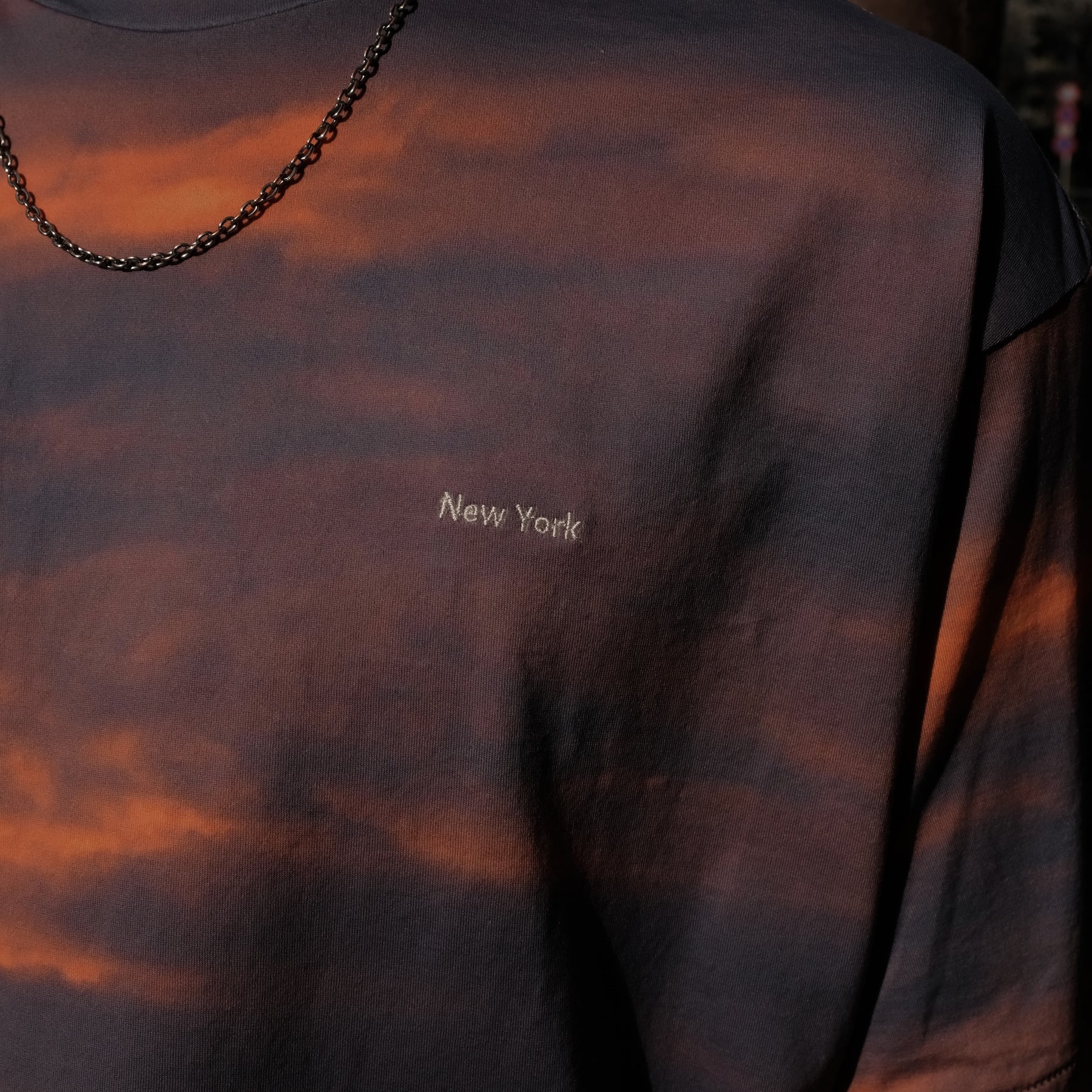 INTODUSK / DUSK SS T NAVY ORANGE