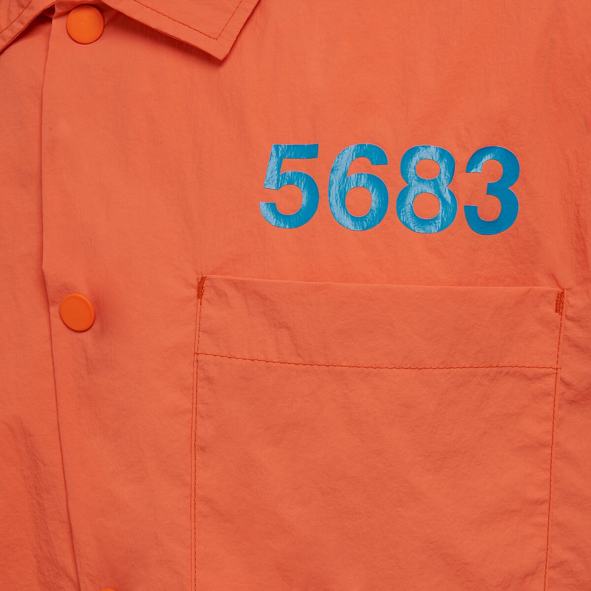 Willy Chavarria (ウィリーチャバリア) × hummel (ヒュンメル) HOME BOY SHIRT SHOCKING ORANGE 20SSコラボレーションアイテム。ロゴ画像。