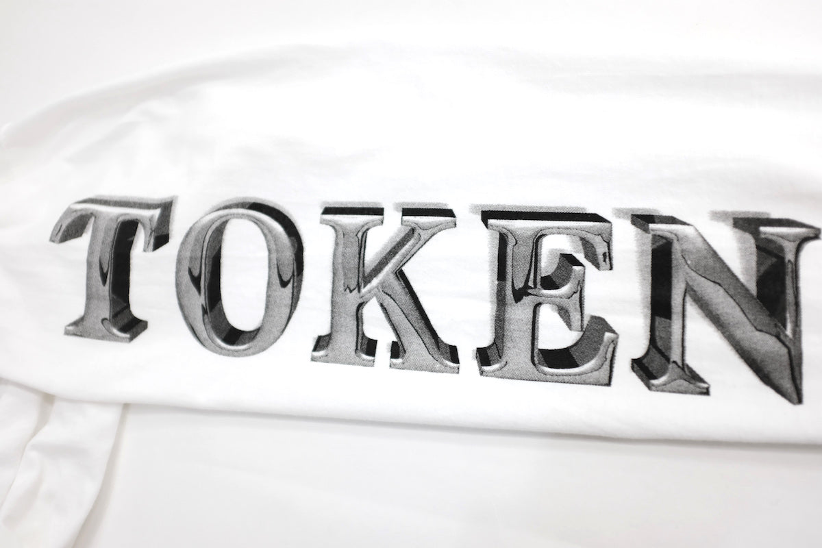 TOKEN / TOKEN TOKEN FINE GARMENTS LS T TOKENよりらしいロンTの入荷です。フロントに【FINE GARMENTS】。バックにはイエローフレイム【TOKEN】。さらには両袖にも【TOKEN】プリント。肌触りの良いボディを仕様。ちょっと細長めのシルエットでしょうか。Tシャツとのレイヤードも抜群です。ロゴ画像。
