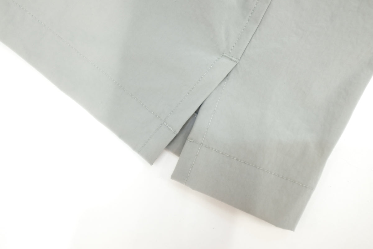 <span style="color: #f50b0b;">Last One</span> GREI. / BAGGY CAMP SHORT PARACHUTE NYLON FOG