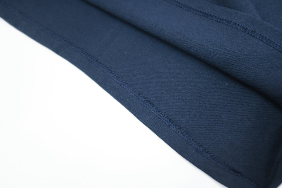 CCTB / NOT FOR SALE T Community Center Tokyo Branch初のオリジナルアイテム。某ボディのHeritage 7oz. Jersey T-Shirtを使用。胸に「Not For Sale」の刺繍。NAVYボディにはWHITEで施しています。縫製画像。