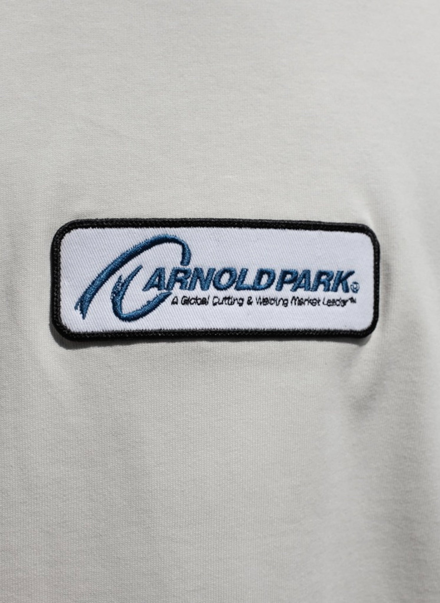 ARNOLD PARK STUDIOS / GLOBAL LEADER LOGO SS T ANTIQUE WHITE