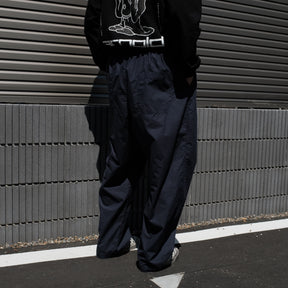 GREI. / PLEATED CRUISER PANT ENZYME WASHED POPLIN MIDNIGHT BLUE