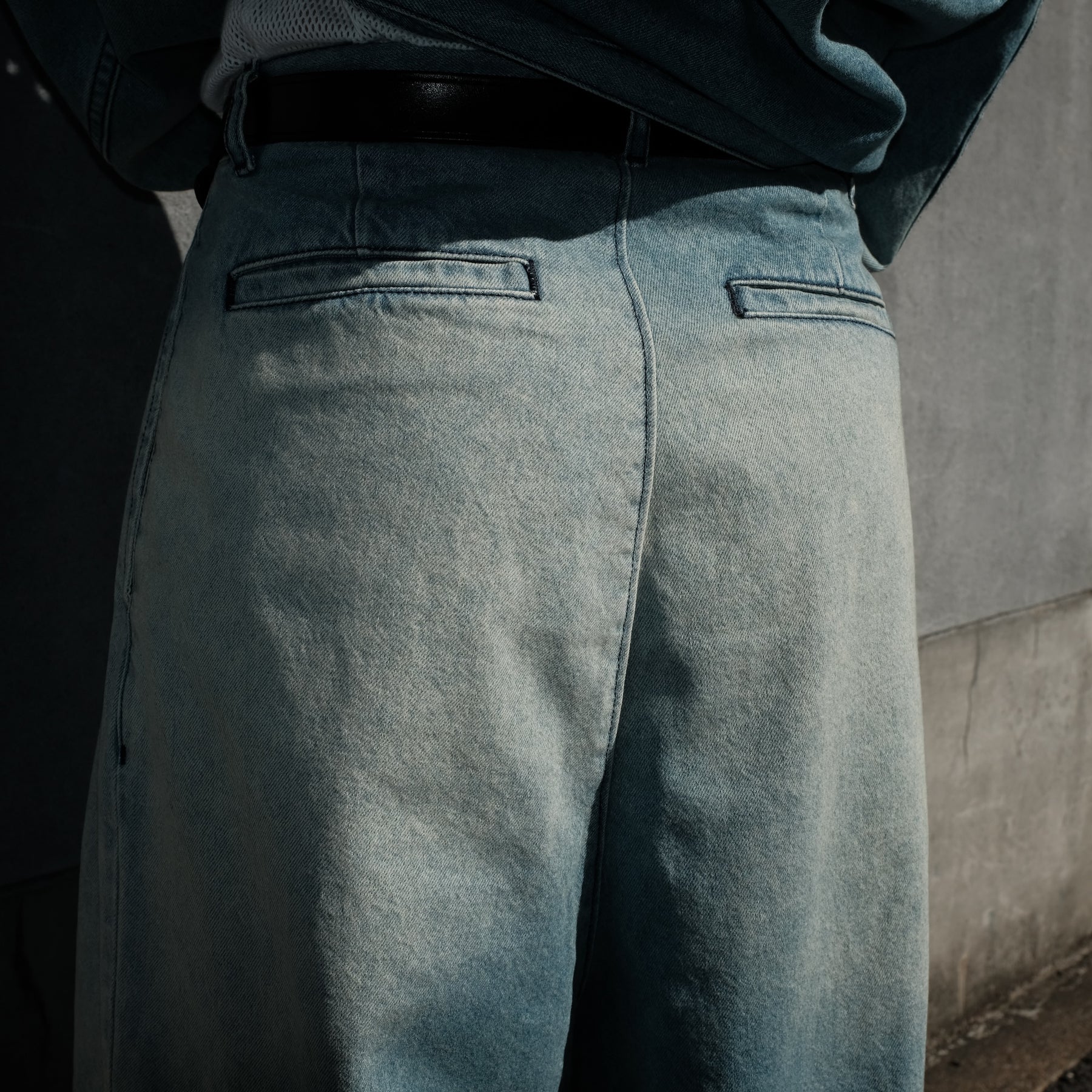 INTODUSK / SKEWED DENIM PANTS HARD WASH BLUE DENIM