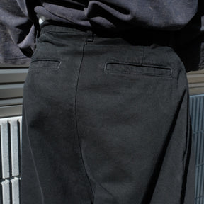 INTODUSK / SKEWED DENIM PANTS SOLID BLACK