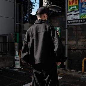 INTODUSK / SLOUCH TRUCKER JACKET PITCH BLACK