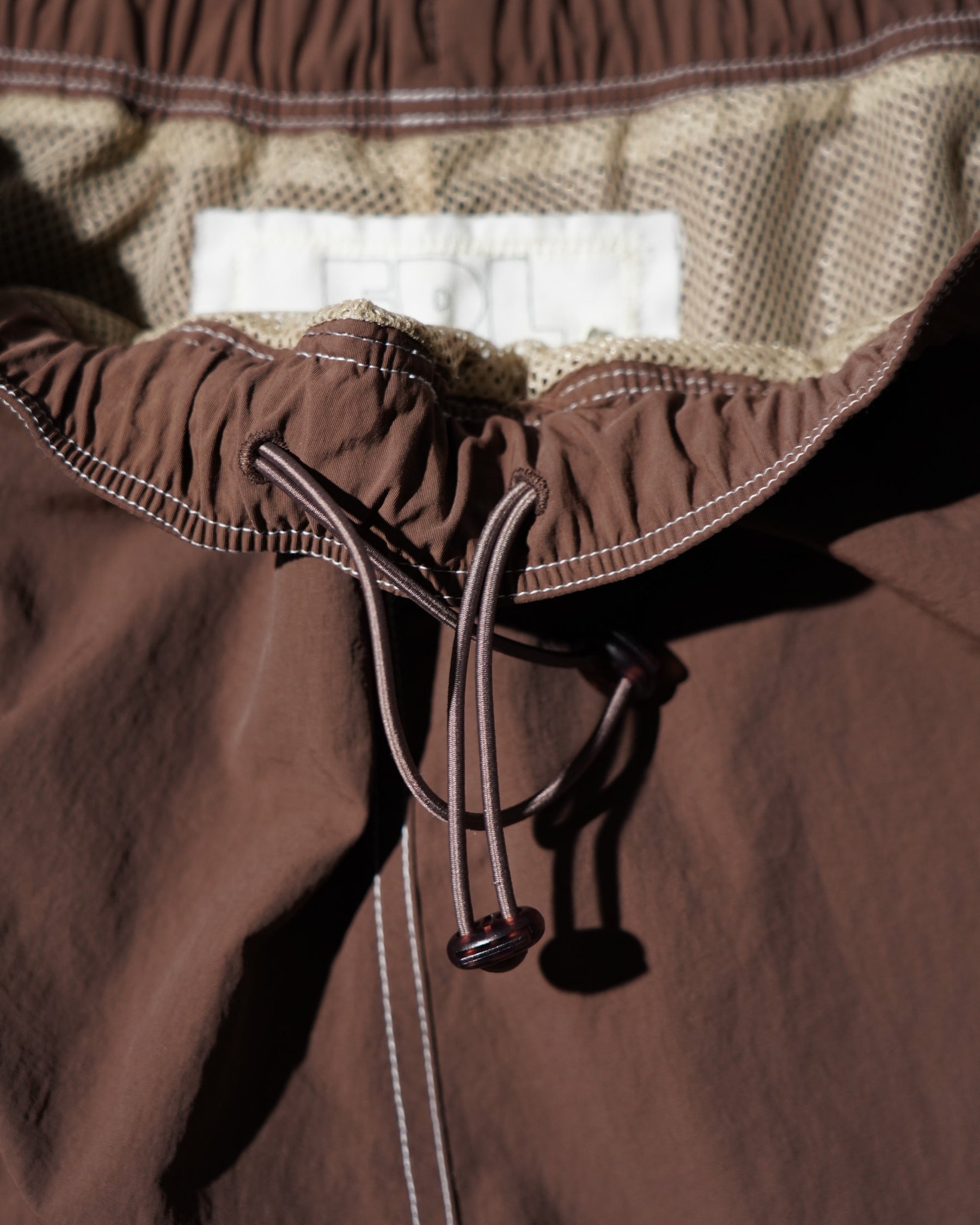 ERL / UNISEX UFO TRACK PANTS WOVEN BROWN 6