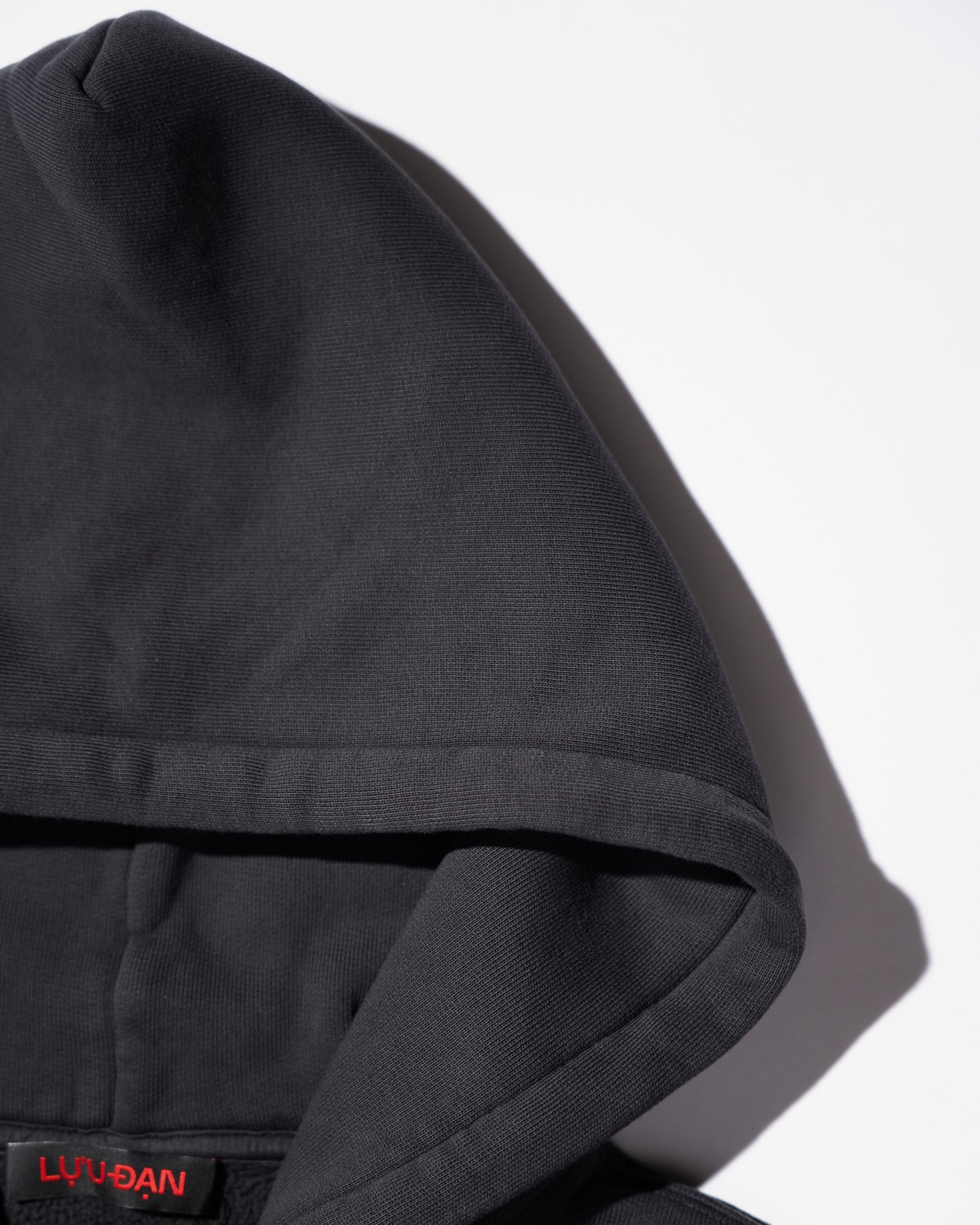 LU'U DAN / WASHED ZIP HOODIE OVERDYED BLACK
