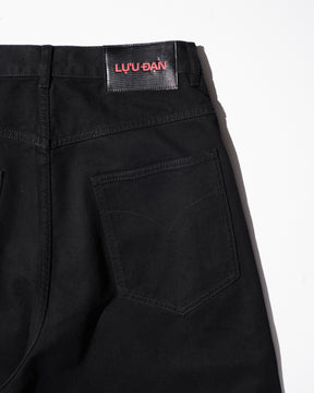 LU'U DAN / SIDE ZIP JEANS BLACK RINSE