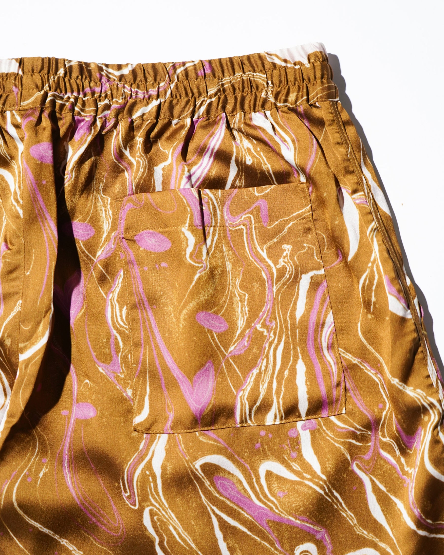 GREI. / TRACK SHORT MARBLE PRINT CURRY