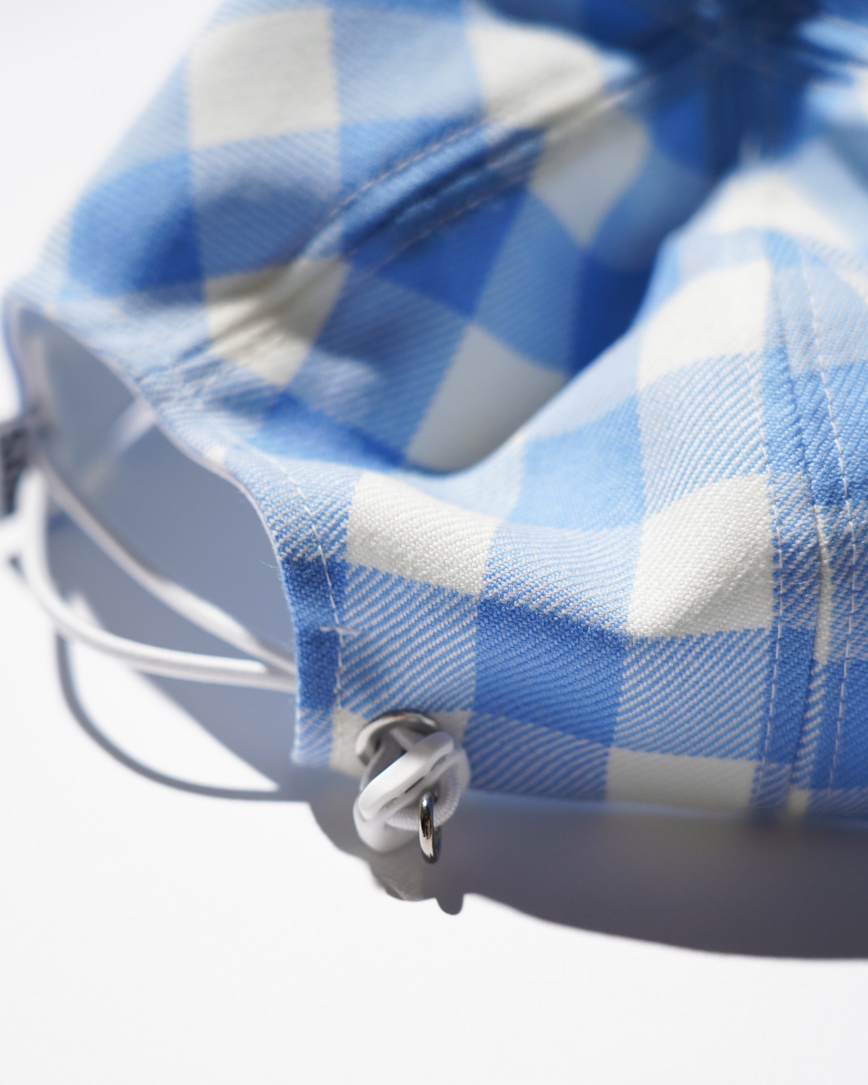 TSTS / GINGHAM WOOL DRAWSTRING CAP SAXE BLUE GINGHAM