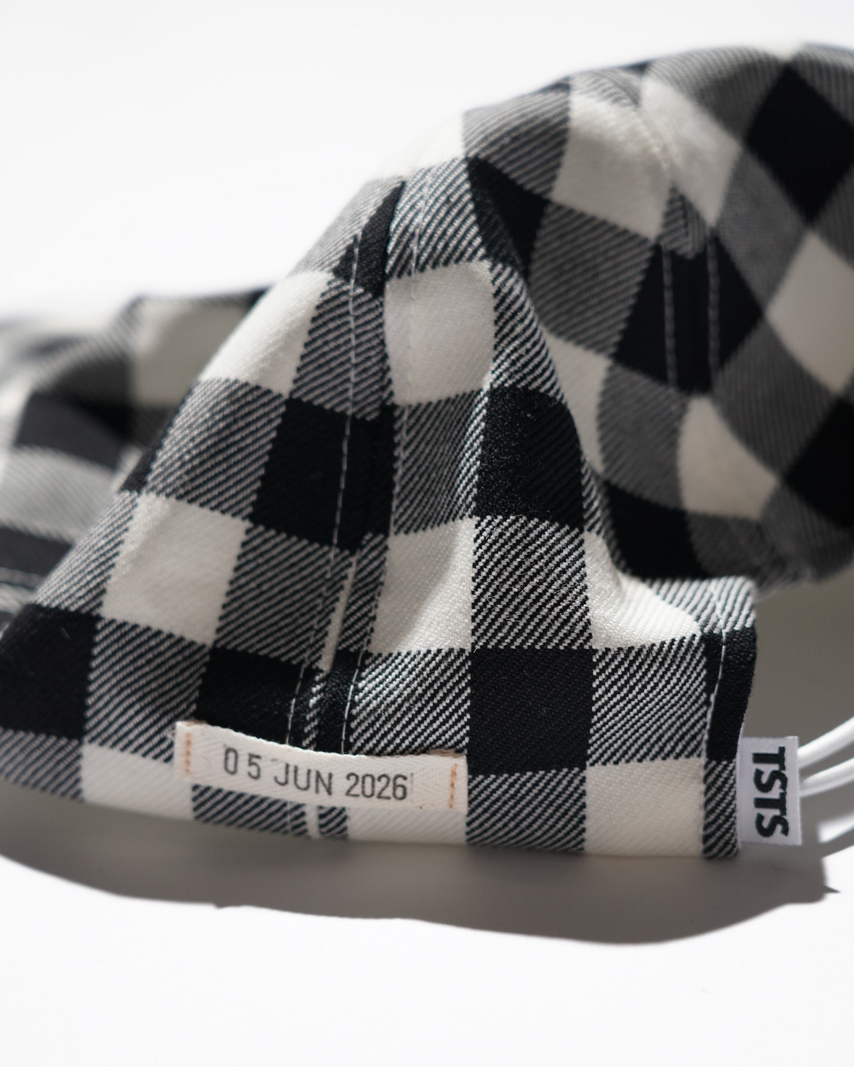<span style="color: #f50b0b;">Last One</span> TSTS / GINGHAM WOOL DRAWSTRING CAP BLACK GINGHAM