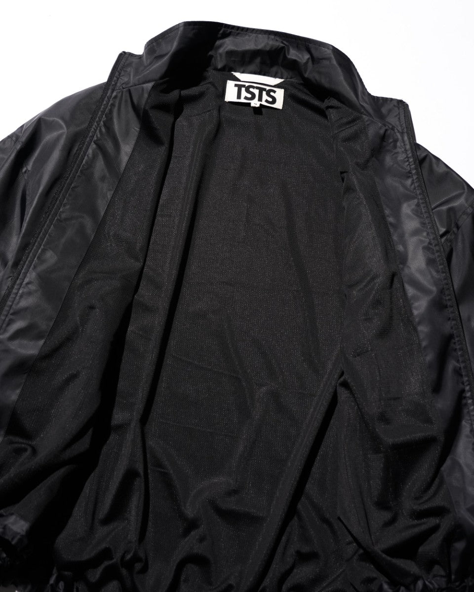 <span style="color: #f50b0b;">Last One</span> TSTS / RECYCLED POLYESTER WIND TRACK JACKET BLACK