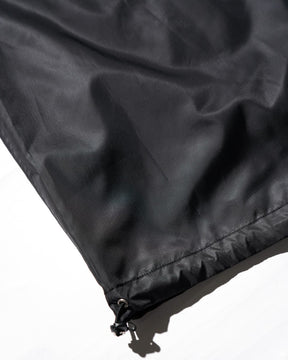 <span style="color: #f50b0b;">Last One</span> TSTS / RECYCLED POLYESTER WIND PANTS BLACK