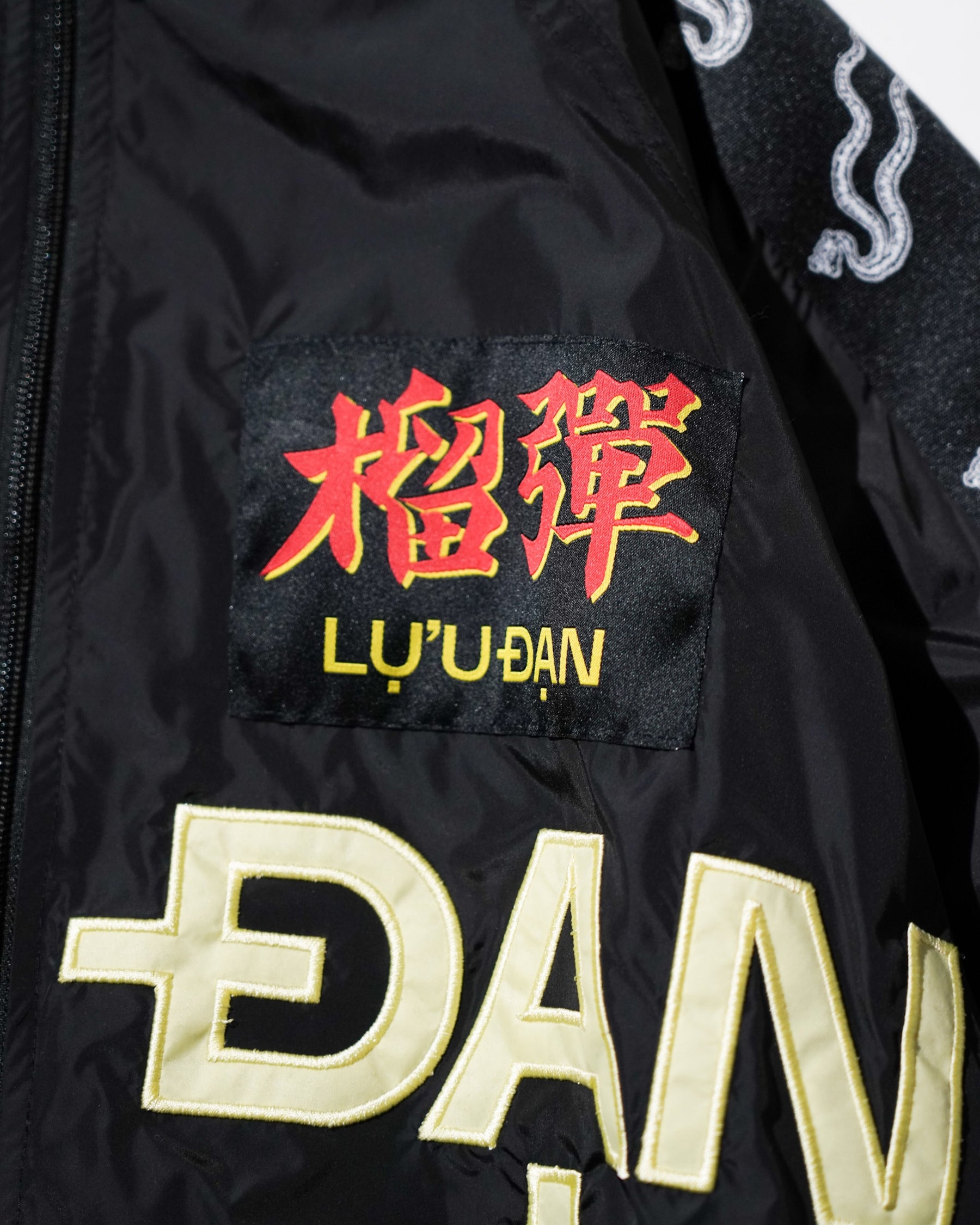 LUU_DAN_WINDBREAKER_L-D_BLACK_OFF-YOLK_10