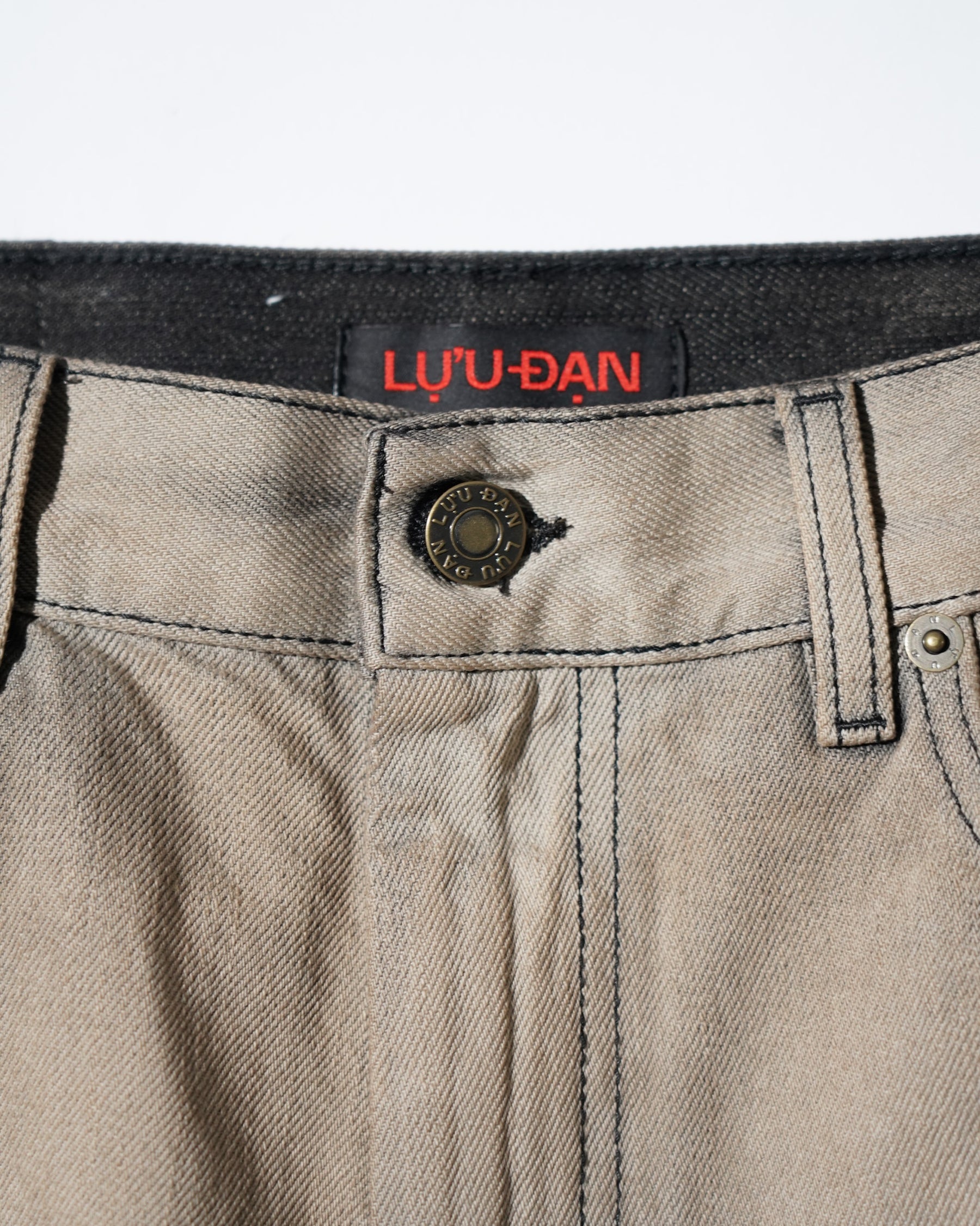 LU'U DAN / SIDE ZIP JEANS DEEP STAIN 10