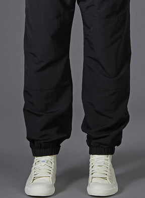 <span style="color: #ff2a00;">Last One</span> GREI. / TRACK PANTS